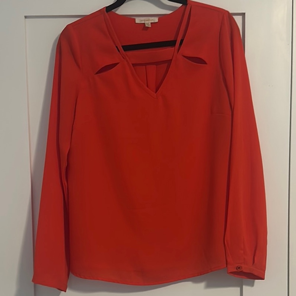 Red long sleeve blouse with cut out neckline